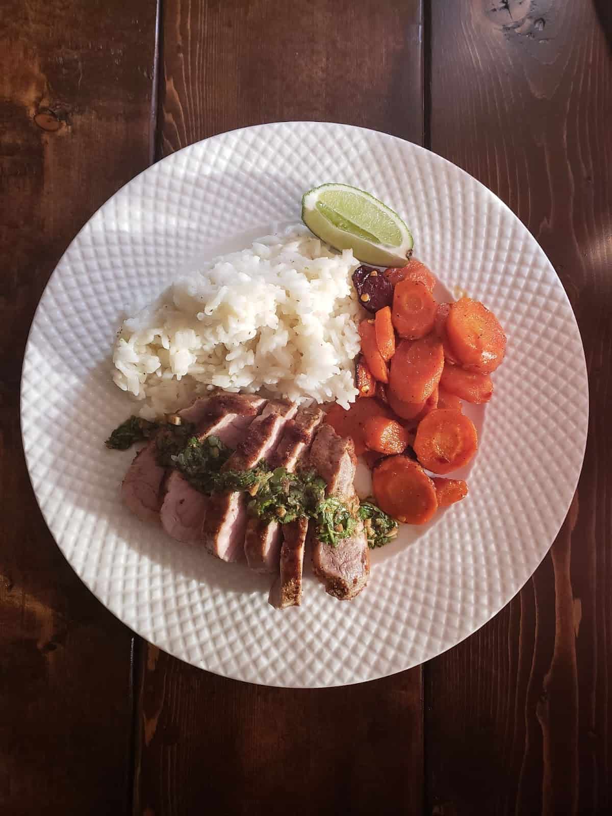 Chimichurri Pork Tenderloin with Honey Roasted Carrots & Lime Rice